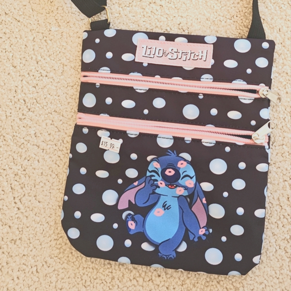 Stitch crossbody purse.